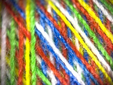 Multicolor yarn thread texture close up macro concept for knitting, textile 库存照片