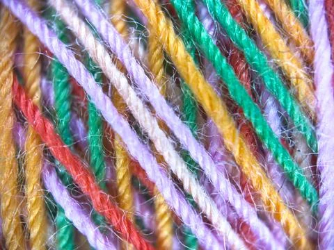 Multicolor yarn thread texture close up macro concept for knitting, textile Stock Photos