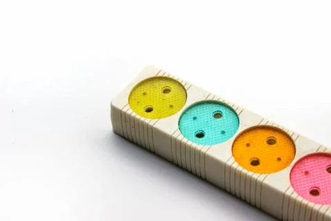 Multicolored 4 plug cable socket on white background Stock Photos