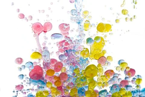 Multicolored abstract background, colorful pattern of oil paints on liquid, b Stock Photos