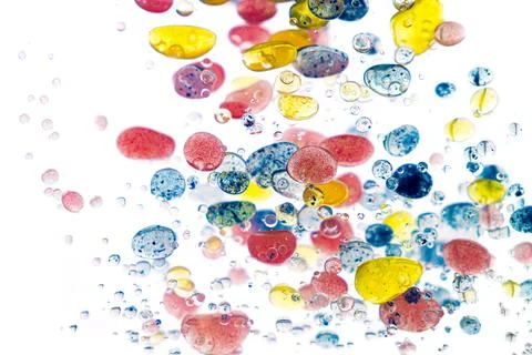 Multicolored abstract background, colorful pattern of oil paints on liquid, b Stock Photos