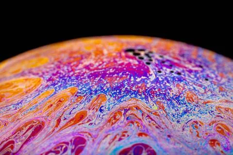 Multicolored abstract chaotic pattern inside of the soap bubble, closeup M... Foto stock