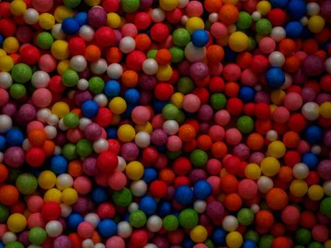 Multicolored abundance as dark background texture Stock Photos