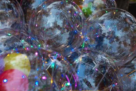 Multicolored background of glowing led balloons Stock Photos