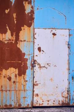 Multicolored background, rusty metal surface with blue paint flaking and meta Stock Photos