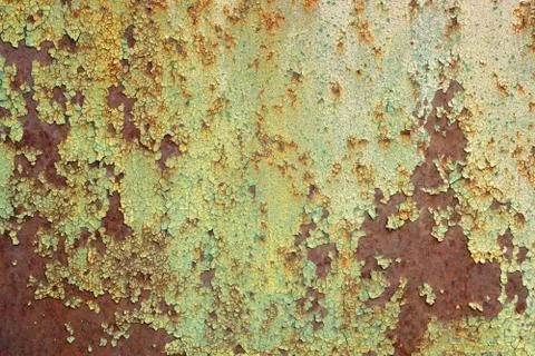 Multicolored background, rusty metal surface with green paint flaking Foto stock