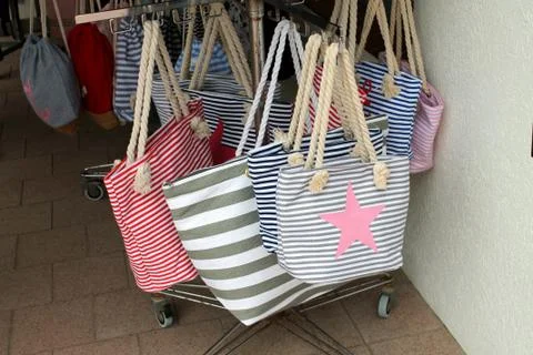 Multicolored bags for the beach. Stock Photos