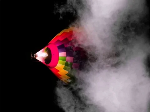 Multicolored balloon in the night sky in the clouds Stock Footage 123249079