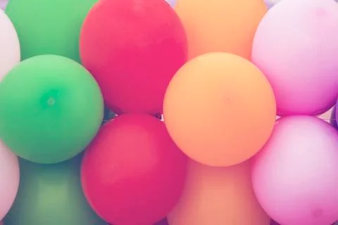 Multicolored balloons background Stock Photos