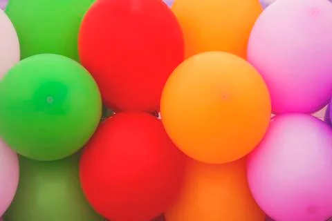 Multicolored balloons background Stock Photos