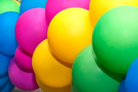Multicolored balloons closeup as background Stock Photos
