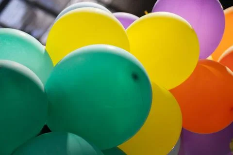 Multicolored balloons in a row Stock Photos
