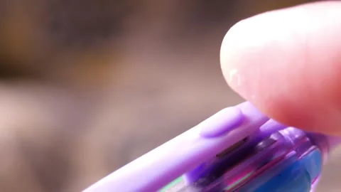 Multicolored Ballpoint Pen Nibs Extending and Retracting with Loud Click Sound Stock Footage 321528029