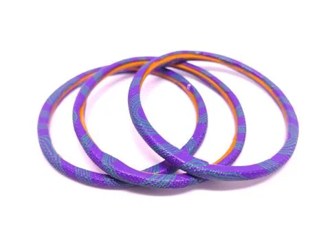 Multicolored Bangles isolated on white background. Bangles are traditionally  Stock Photos