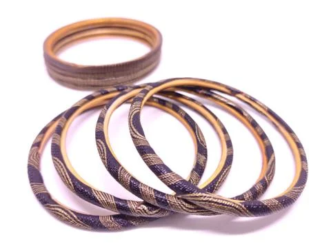 Multicolored Bangles isolated on white background. Bangles are traditionally  Stock Photos