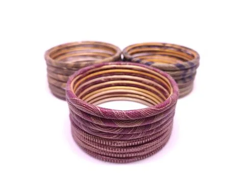 Multicolored Bangles isolated on white background. Bangles are traditionally  Stock Photos