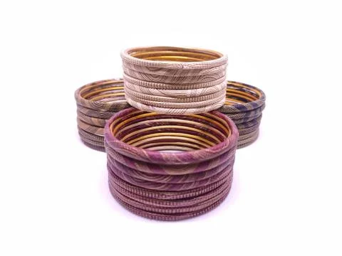 Multicolored Bangles isolated on white background. Bangles are traditionally  Stock Photos