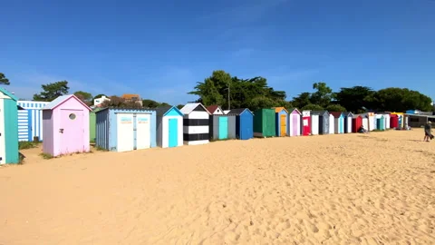 Multicolored bathing cabins of the beach of La Boirie in Saint-Denis d'Oleron Stock Footage 276834465