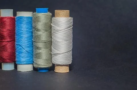 Multicolored bobbin thread. Polypropylene multifilament yarns. Set of sewing  Stock Photos