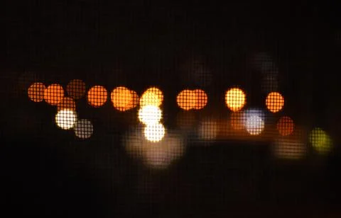 Multicolored bokeh on black background Stock Photos