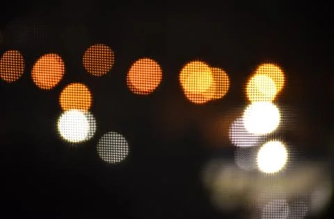 Multicolored bokeh on black background Stock Photos