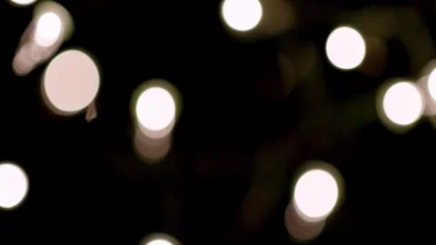 Multicolored bokeh confetti effect glimmering over a black background Stock Footage 301896727