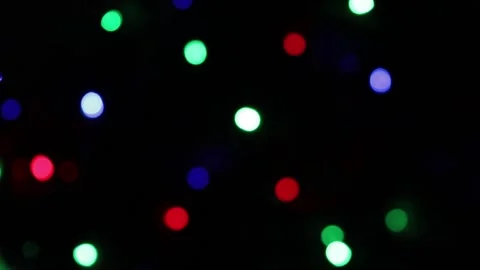 Multicolored bokeh on a dark background Stock Footage 166121505