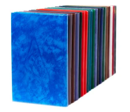 Multicolored book on a white background Stock Photos