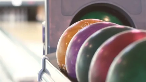 Multicolored bowling balls. Slow motion shot of a bowling game. Bowling backgrou Stock-Footage 105713236