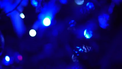 Multicolored branches of light a black background. Christmas background Stock Footage 145709970