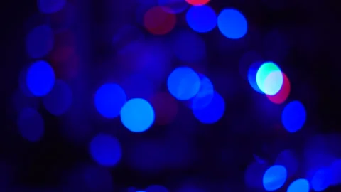 Multicolored branches of light a black background. Christmas background Stock Footage 145709978