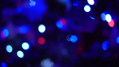 Multicolored branches of light a black background. Christmas background 스톡 동영상 145710022