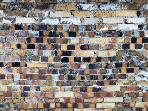 Multicolored brick block wall texture pattern background Stock Photos