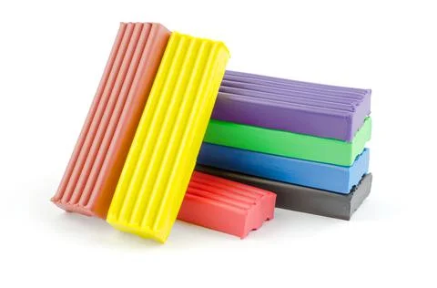 Multicolored bright plasticine on a white background, isolate Stock Photos