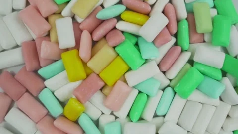 Multicolored bubble gum background rotate view from above. Video stock 167839247