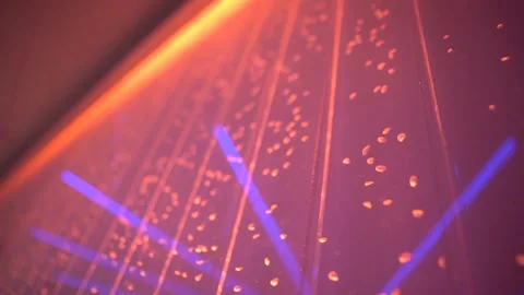 Multicolored bubbles rise in the glass surface of the wall Stock Footage 131017001
