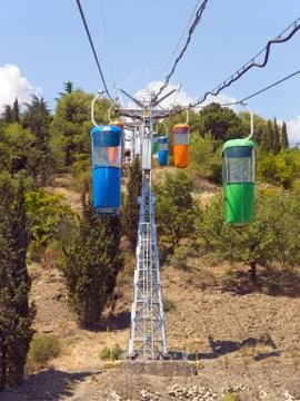 Multicolored cabins of cable railway Stock Photos