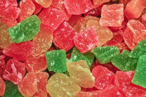 Multicolored candied pineapple Stock Photos