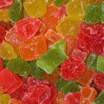 Multicolored candied pineapple Stock Photos