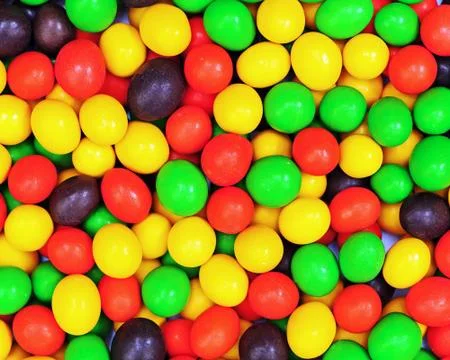 Multicolored candies for use as background. Stock Photos