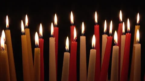 Multicolored candles on black background. Stock Footage 8960769