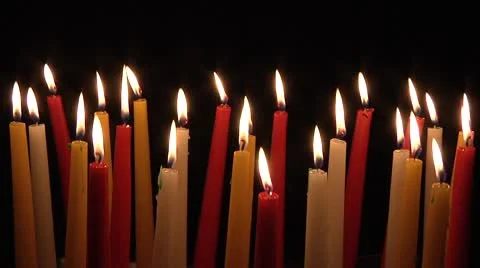 Multicolored candles burning. Stock Footage 8961440