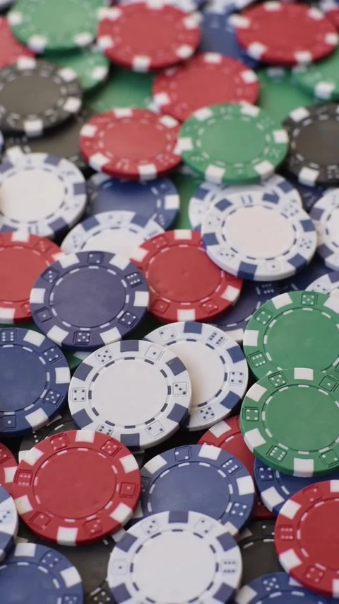 Multicolored casino chips as a conceptual backdrop for poker, blackjack. Multico Stock Footage 332122801