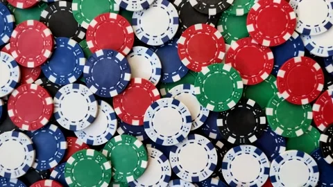 Multicolored casino chips as a conceptual backdrop for poker, blackjack. Multico Stock Footage 332122837