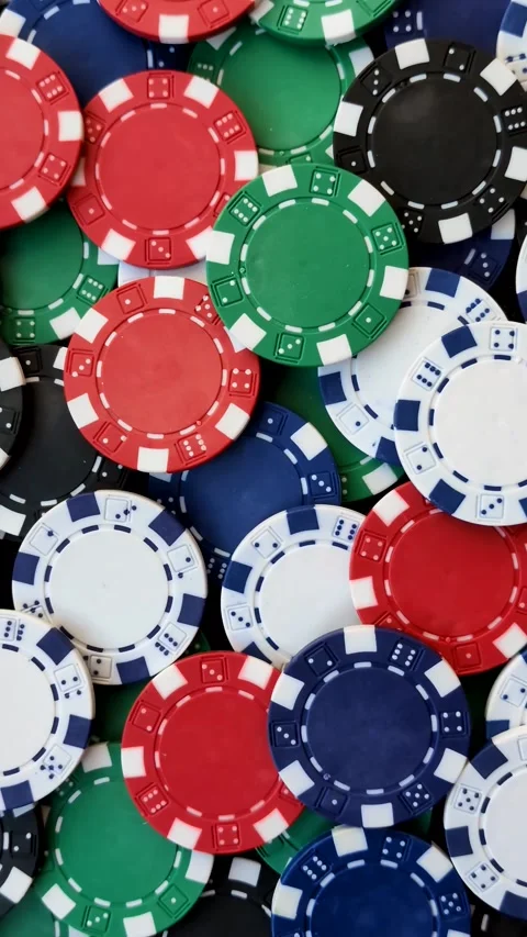Multicolored casino chips as a conceptual backdrop for poker, blackjack. Multico Stock Footage 332122845