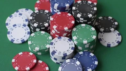 Multicolored casino chips as a conceptual backdrop for gambling games. Multicolo Stock Footage 332267670