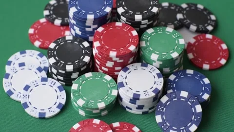Multicolored casino chips as a conceptual backdrop for gambling games. Multicolo Stock Footage 332267671