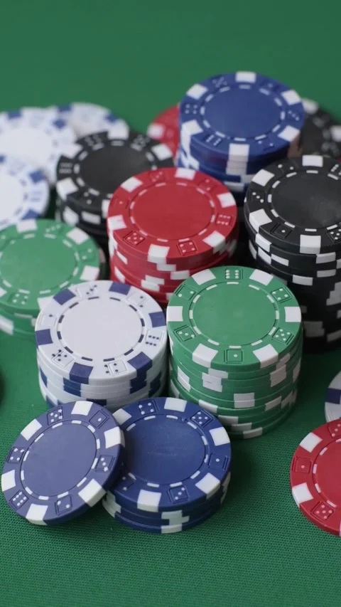 Multicolored casino chips as a conceptual backdrop for gambling games. Multicolo Stock Footage 332267683