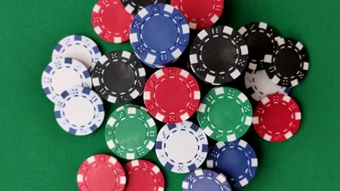Multicolored casino chips as a conceptual backdrop for gambling games. Multicolo Stock Footage 332267765