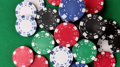 Multicolored casino chips as a conceptual backdrop for gambling games. Multicolo Stock Footage 332267778
